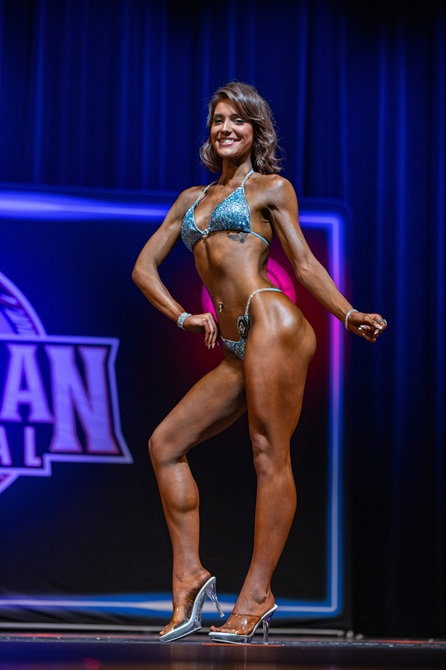 Mary competing in Figure at NPC Nationals